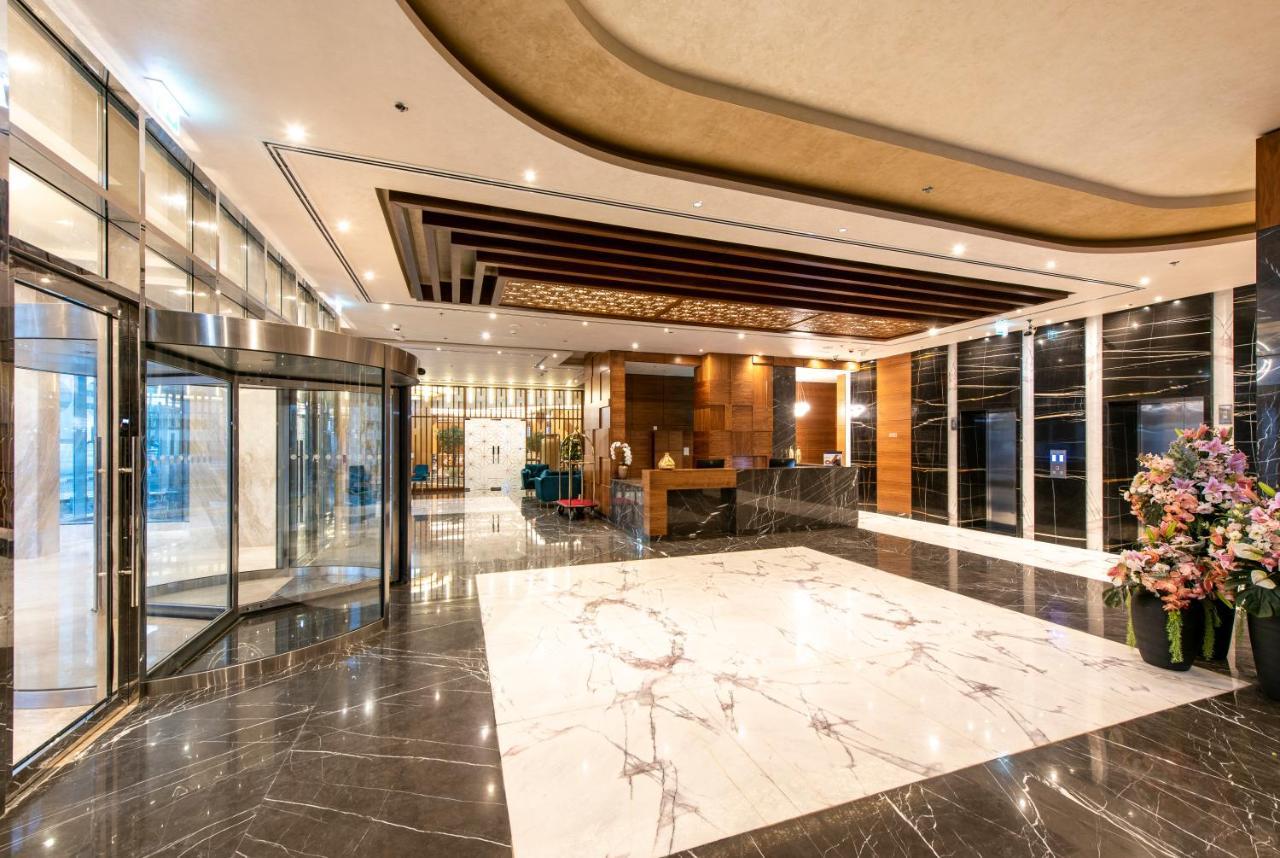 Luxe Grand Hotel Apartments Sharjah Esterno foto Lobby